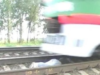 SOCANT! Noua distractie din Rusia: cum sa treaca trenul peste tine! Vezi FOTO: