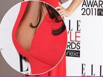 
	FOTO / Cheryl Cole si-a aratat un SFARC pe covorul rosu! Toti fotografii au innebunit:
