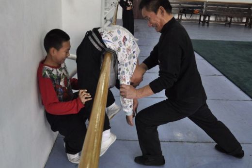 Imaginile care au CUTREMURAT planeta! Antrenamente inumane pentru copiii chinezi care vor sa se faca gimnasti_2