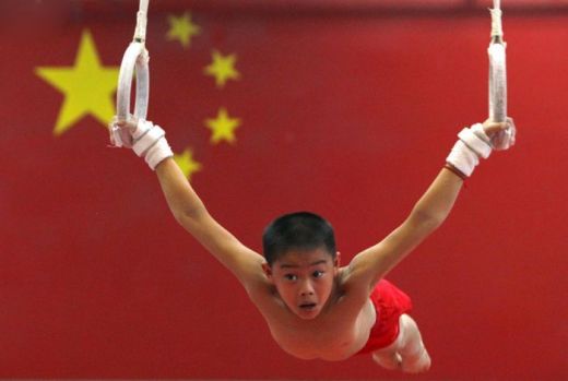 Imaginile care au CUTREMURAT planeta! Antrenamente inumane pentru copiii chinezi care vor sa se faca gimnasti_14