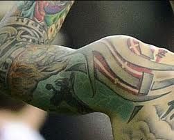 Le-a promis colegilor de la Liverpool ca si-i tatueaza pe toti daca vor castiga titlul! Cine are cele mai tari tatuaje: SUPERFOTO_3