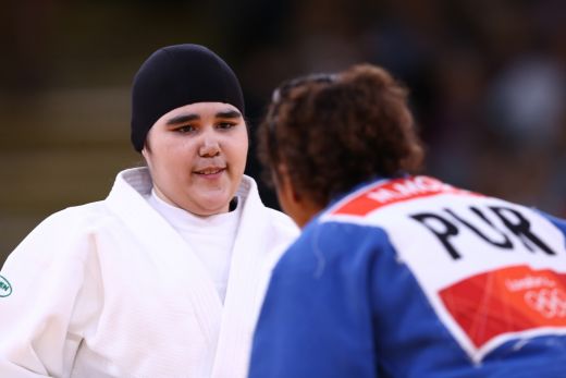 FOTO Moment ISTORIC la Jocurile Olimpice! Prima sportiva din Arabia Saudita a concurat cu capul ACOPERIT!_1