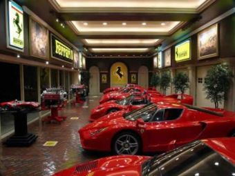 
	FOTO Cum arata casa unui miliardar OBSEDAT de Ferrari! Asa ceva e UNIC in lume! Masini de MILIARDE in sufragerie!
