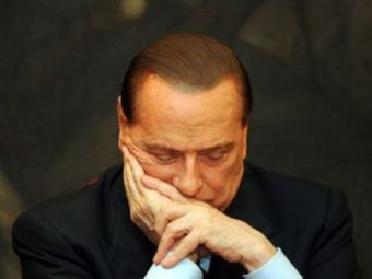 
	OFICIAL! Berlusconi ii putea aduce pe Messi si Ronaldo la Milan de banii astia! Plateste 100.000 de euro pe zi in timp ce clubul nu isi revine financiar! Ce a patit:
