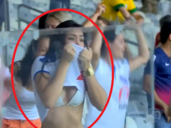 
	IMAGINEA ZILEI in Brazilia! O fana si-a ridicat tricoul si a aratat mai mult decat trebuia dupa golul marcat de favoritii sai: VIDEO
