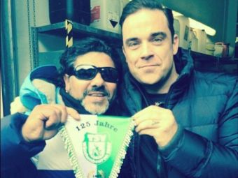 
	Faza de Las Fierbinti la un concert al lui Robbie Williams: ce s-a intamplat dupa ce a facut poza vietii cu Maradona :))
