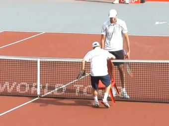 
	David si Goliath s-a intalnit pe terenul de tenis :) La finalul meciului, cei doi au facut toata arena sa rada cu un moment UNIC
