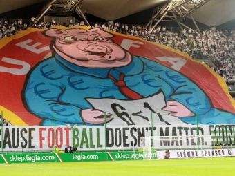 
	UEFA a deschis o ancheta pentru bannerul afisat de suporterii Legiei in Europa League! Ce risca polonezii:
