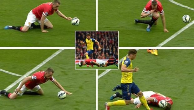 
	Cel mai bizar tackling din Premier League in 2015! Ce a incercat sa faca Phil Jones in fata lui Giroud. FOTO
