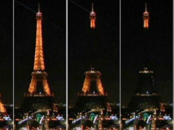 Imaginea unei nopti de teroare: Turnul Eiffel a fost stins pentru prima data in 126 de ani. Mai multe cladiri reprezentative din toata lumea s-au luminat in culorile Frantei