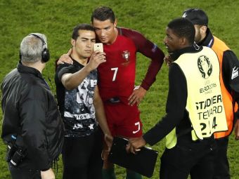 Zero goluri, ZERO probleme! Ronaldo a stat la selfie cu un fan care a patruns pe gazon la finalul meciului cu Austria. FOTO