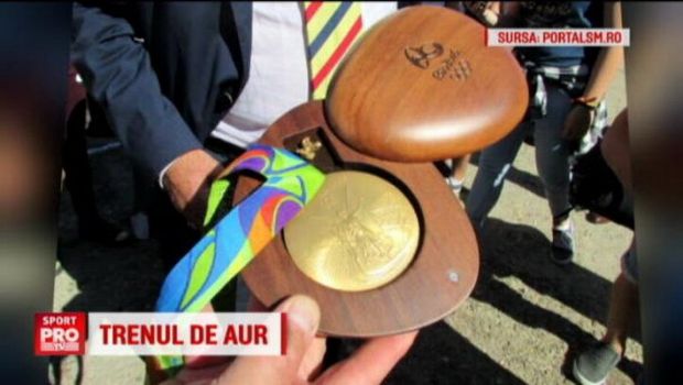 
	Trenul cu aur. Campioana olimpica Simona Pop a &quot;plimbat&quot; medalia castigata la Rio cu trenul si a fost asteptata la Satu Mare de o multime de oameni
