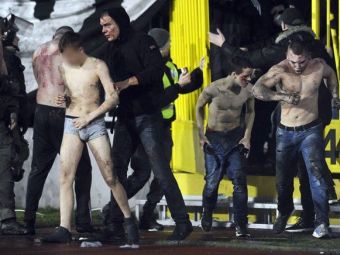 
	Scene socante: a fost macel la Partizan - Steaua Rosie! Ultrasii lui Partizan s-au batut intre ei, iar invinsii au fost dezbracati la piele si arsi cu tortele
