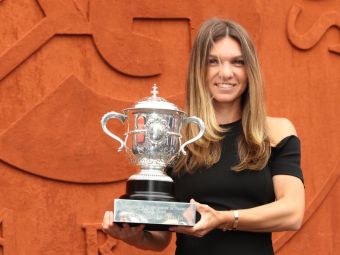 
	A avut loc sedinta foto a Simonei Halep cu trofeul Roland Garros! Cum s-a imbracat Simona la eveniment FOTO
