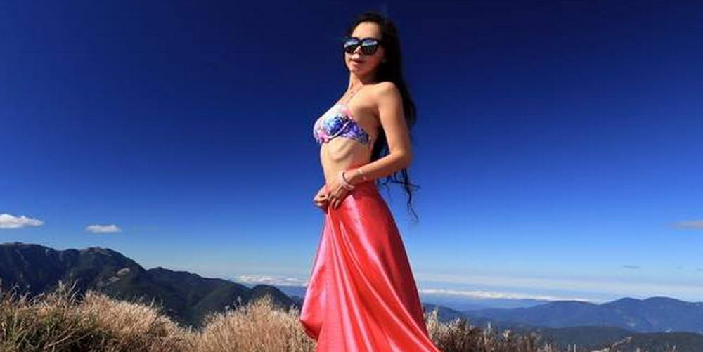 Gigi WU, modelul care se catara in bikini pe munti, a murit dupa ce a cazut intr-o rapa. FOTO_19