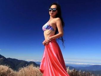 
	Gigi WU, modelul care se catara in bikini pe munti, a murit dupa ce a cazut intr-o rapa. FOTO
