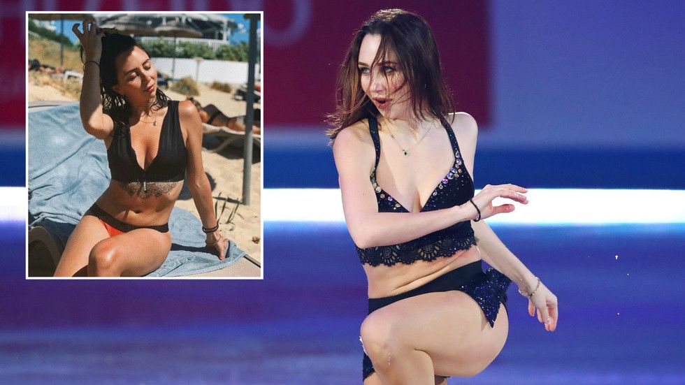 Patinatoarea sexy care a devenit celebra cu un numar de striptease pe gheata, imagini fierbinti din vacanta in Cipru! GALERIE FOTO_17