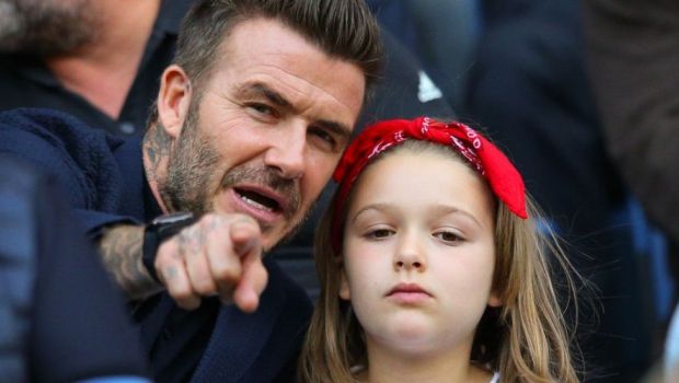
	David Beckham si-a sarutat fiica de 9 ani pe BUZE si a declansat o FURTUNA de critici. Cine a sarit in apararea fostului fotbalist
