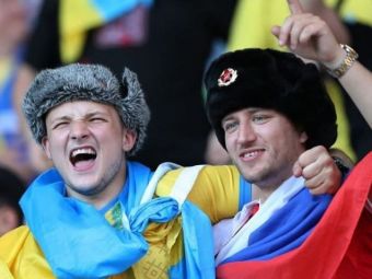 
	Un suporter s-a imbracat in tricoul Rusiei si s-a dus printre fanii ucraineni! E incredibil ce a putut sa urmeze dupa o repriza de zambete. Imaginile fac inconjurul lumii
