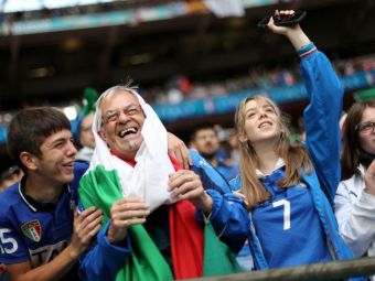 
	Italia a castigat batalia din tribune! Suporterita care a atras toate privirile
