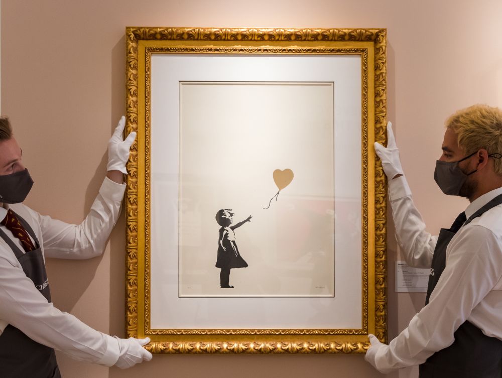 "Fata cu balon" a lui Banksy a fost vândută pentru suma record de 18,6 milioane de lire sterline. Cum arată creația_2