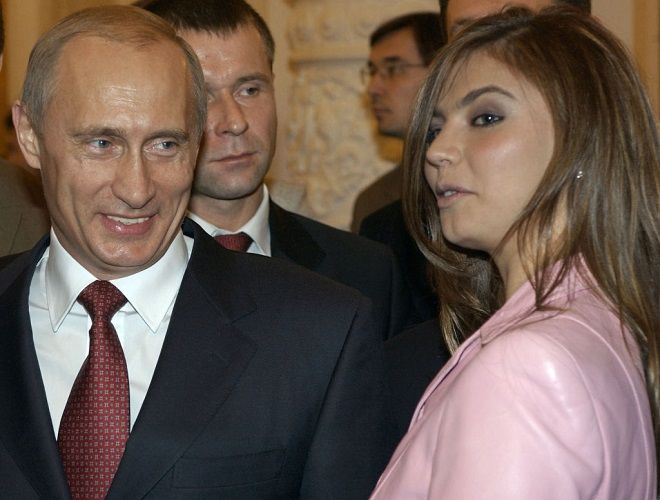 Femeia care l-a vrăjit pe Putin a pozat nud în urmă cu 18 ani! Campioana olimpică și președintele Rusiei ar avea un copil_16