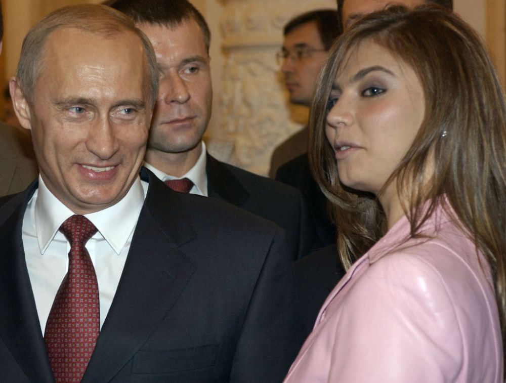 Femeia care l-a vrăjit pe Putin a pozat nud în urmă cu 18 ani! Campioana olimpică și președintele Rusiei ar avea un copil_3