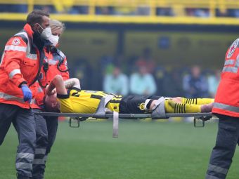 
	Marco Reus, accidentare oribilă cu două luni înainte de Cupa Mondială! Căpitanul lui Dortmund, scos pe targă de pe teren
